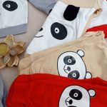 Girls' and boys' blouse and pants set suitable for ages 3 to 9 years old.