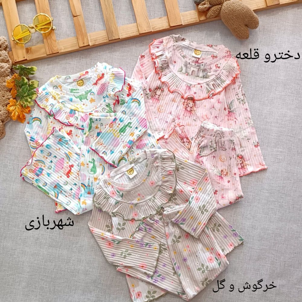 Girls' matching blouse and pants set, suitable for ages 2 to 9 years old.