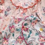 Girls' matching blouse and pants set, suitable for ages 2 to 9 years old.