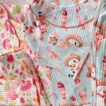 Girls' matching blouse and pants set, suitable for ages 2 to 9 years old.