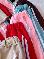 T-shirts and pants for girls and boys, 4 to 7 years old.
