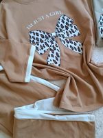 Girls' and women's T-shirts and pants, size 70