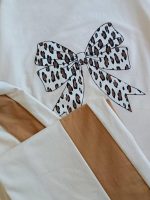 Girls' and women's T-shirts and pants, size 70
