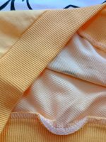 Girls' and boys' blouse and trousers sets (ages 2 to 5)
