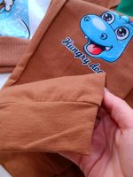 Girls' and boys' blouse and trousers, sizes 35 to 50