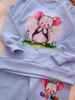 Girls' and boys' blouse and trousers, sizes 40 and 45