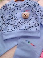 Girls' and boys' tops and trousers, ages 1 to 5 years
