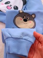 Girls' and boys' tops and trousers, sizes 35 to 50