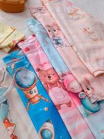 Girls' and boys' tops and trousers, sizes 35 to 50