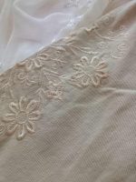 Girls' and women's blouses, ranging from age 13 up to size 42