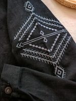 Girls' and women's blouses, ranging from age 13 up to size 42