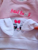 Girls' blouse and trousers, sizes 30 to 45