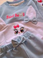 Girls' blouse and trousers, sizes 30 to 45