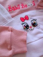 Girls' blouse and trousers, sizes 30 to 45