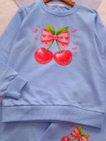 Girls' blouse and trousers, sizes 45 to 60