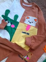 Girls' and boys' blouse and trousers, sizes 45 and 50