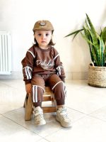 Girls' and boys' blouse and trousers, sizes 60 and 65