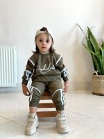 Girls' and boys' blouse and trousers, sizes 60 and 65