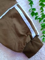 Girls' and boys' blouse and trousers, sizes 60 and 65