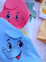 Girls' and boys' tops and trousers, ages 1 to 5 years