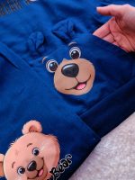 Girls' and boys' tops and trousers, ages 2 to 5