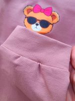 Girls' and boys' tops and trousers, ages 4 to 7