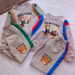 Girls' and boys' tops and trousers, sizes 40 to 65