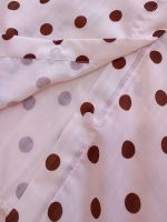 Girls' and women's blouses, ranging from age 14 up to size 46