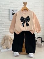 Girls' blouse and trousers, ages 3 to 11