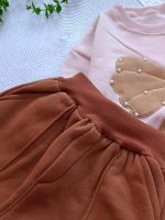 Girls' blouse and trousers, ages 3 to 11