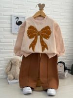 Girls' blouse and trousers, ages 3 to 11