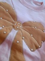 Girls' blouse and trousers, ages 3 to 11