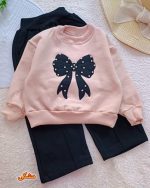 Girls' blouse and trousers, ages 3 to 11