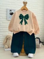 Girls' blouse and trousers, ages 3 to 11
