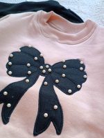 Girls' blouse and trousers, ages 3 to 11