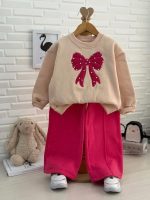 Girls' blouse and trousers, ages 3 to 11