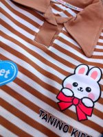 Girls' blouse and trousers, ages 4 to 7