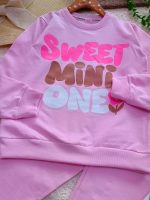 Girls' blouse and trousers, ages 7 to 11