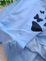 Girls' blouse and trousers, ages 7 to 11