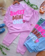 Girls' blouse and trousers, ages 7 to 11