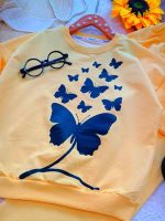 Girls' blouse and trousers, ages 7 to 11