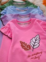 Girls' blouse and trousers, sizes 45 and 50