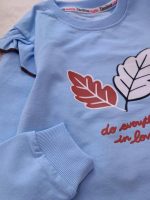 Girls' blouse and trousers, sizes 45 and 50