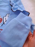 Girls' blouse and trousers, sizes 45 and 50