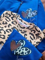 Girls' sweatshirt and trousers, sizes 35 to 55