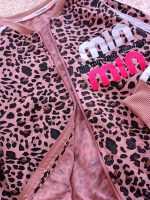 Girls' sweatshirt and trousers, sizes 40 to 55