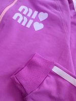Girls' sweatshirt and trousers, sizes 50 to 60