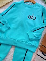 Girls' and boys' blouse and trousers, sizes 45 and 50