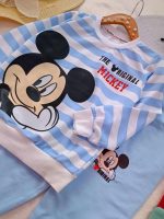 Girls' and boys' blouse and trousers, sizes 45 to 50