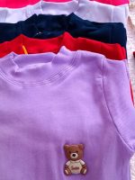 Girls' and boys' blouses, sizes 45 and 50